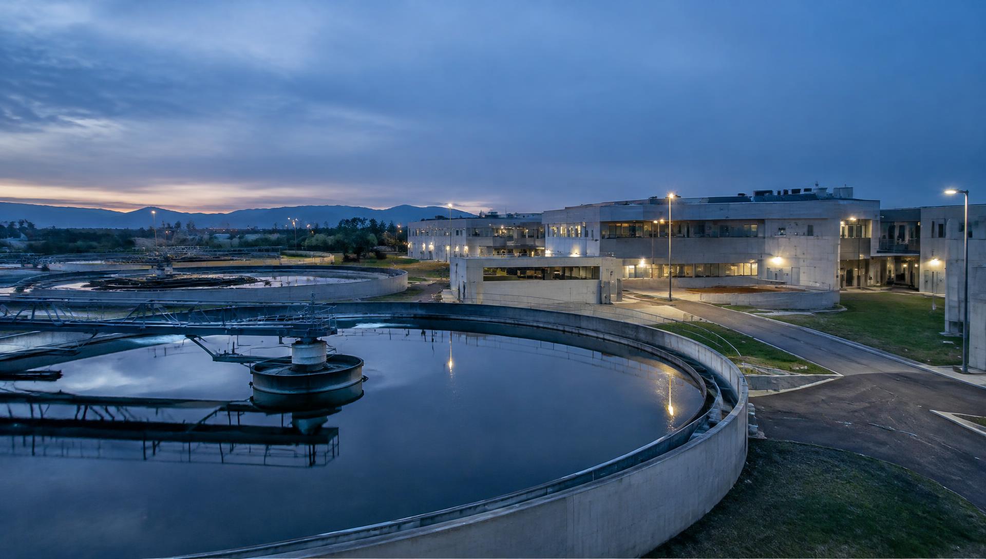 Municipal water treatment plant at dusk